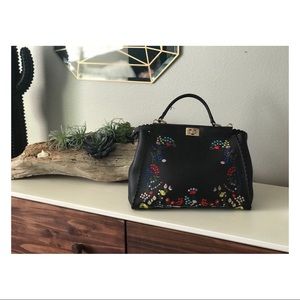 Black floral purse.